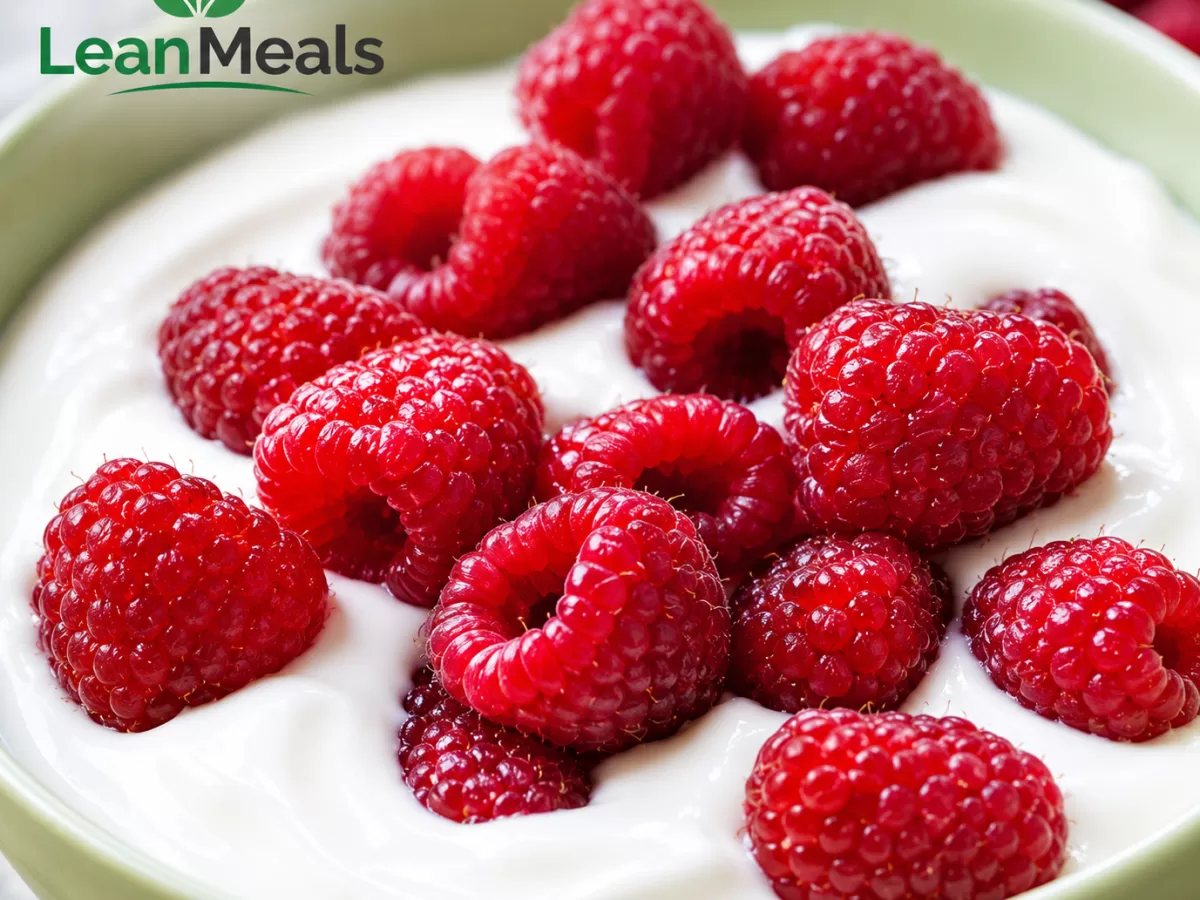 Greek yogurt with frozen or fresh raspberries